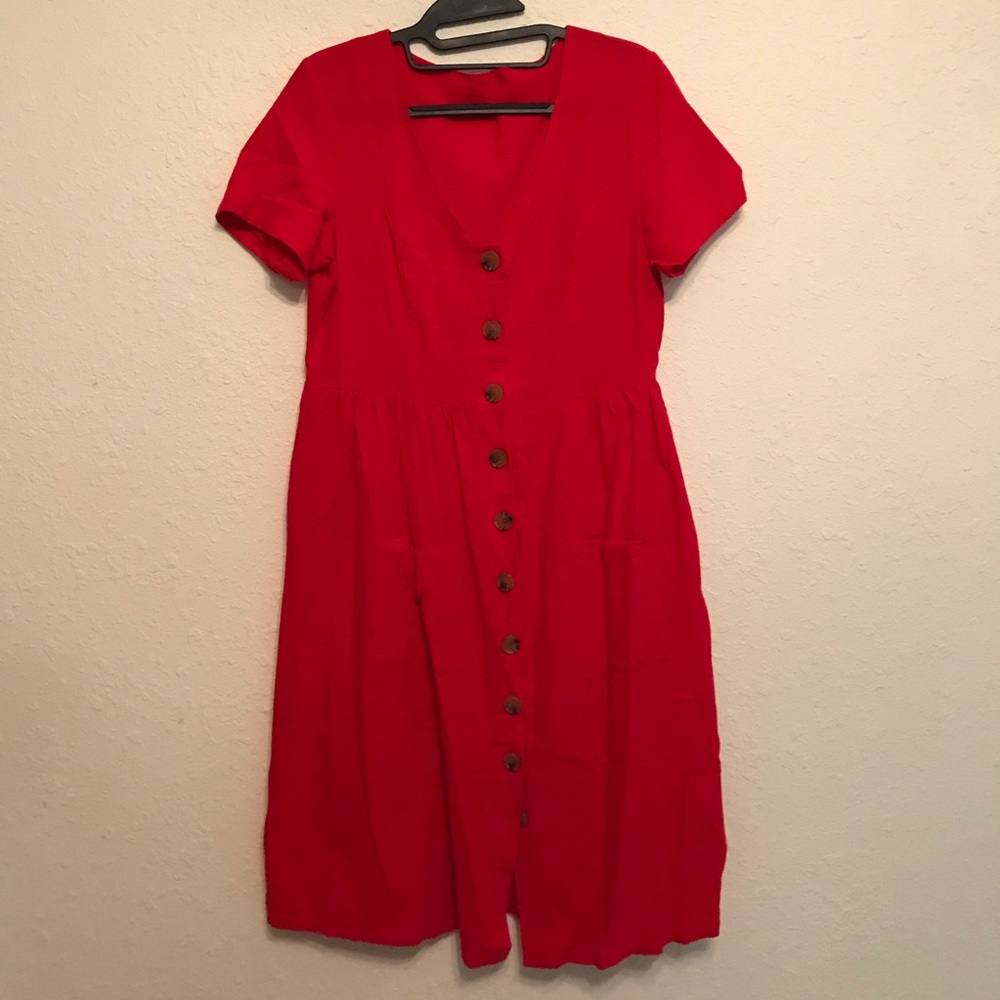Red button down dress with front pockets.